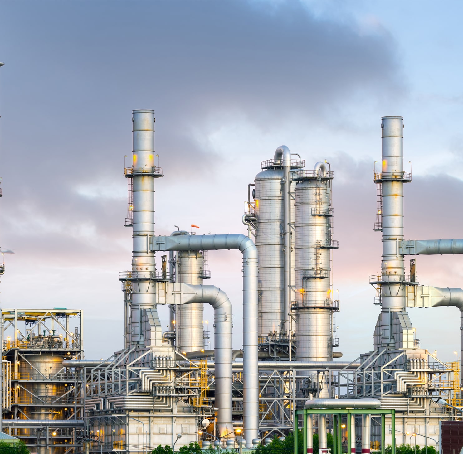 A close-up industrial view of a chemical refinery.
