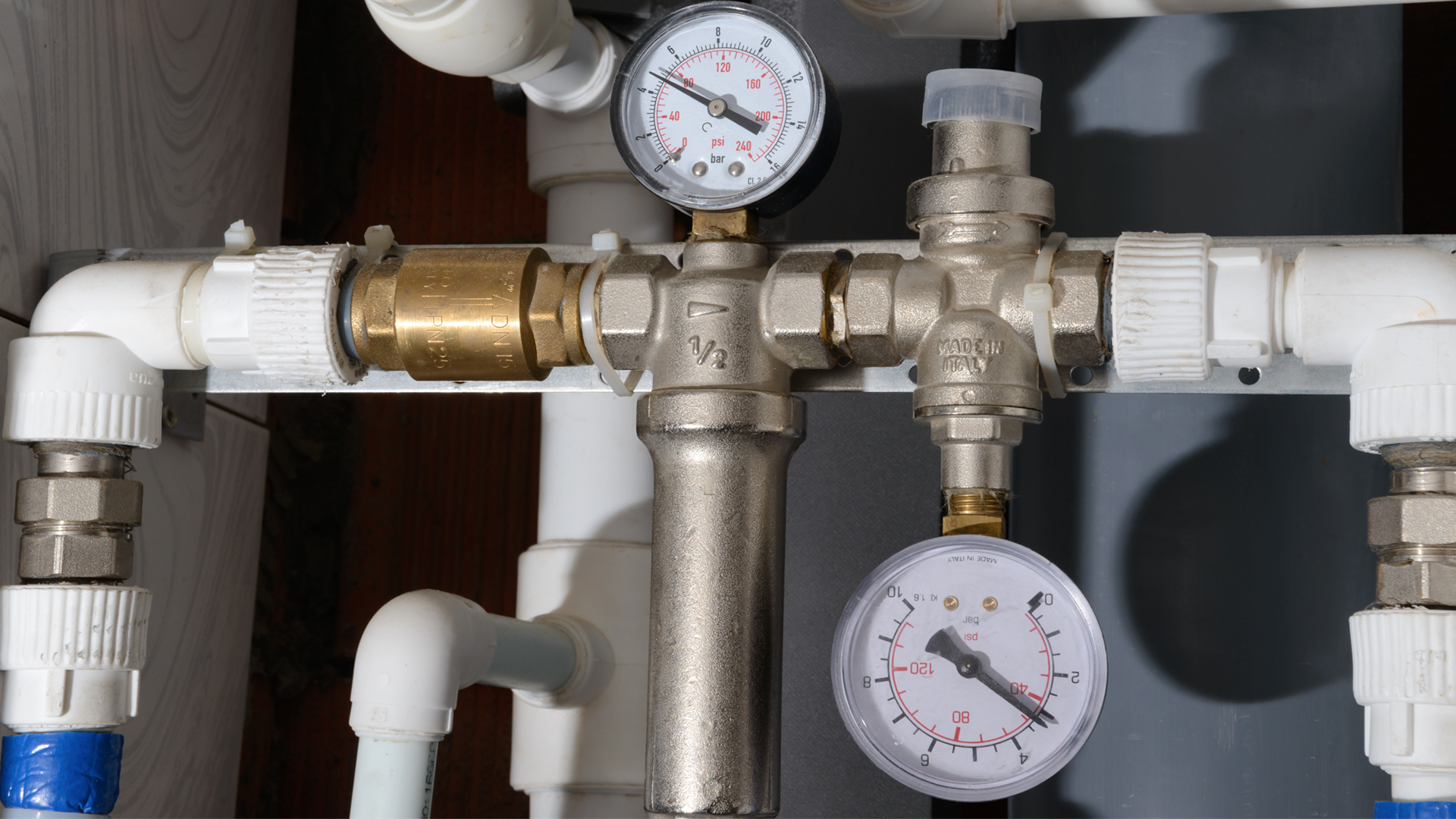 Industrial pipes with pressure gauges and check valves